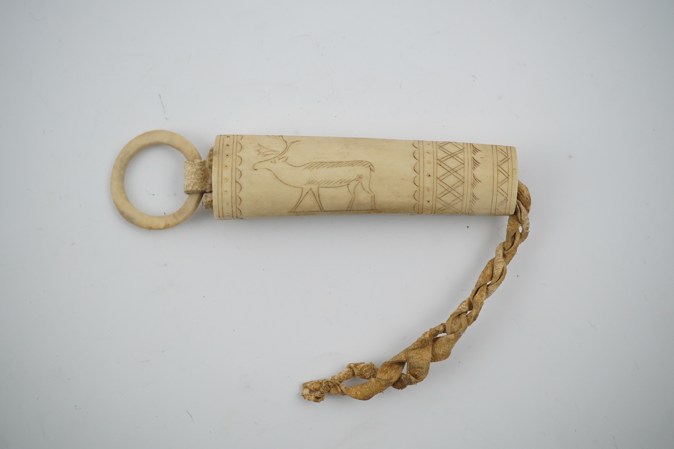 A Sami carved reindeer antler needle case, 10cm high., Condition - good